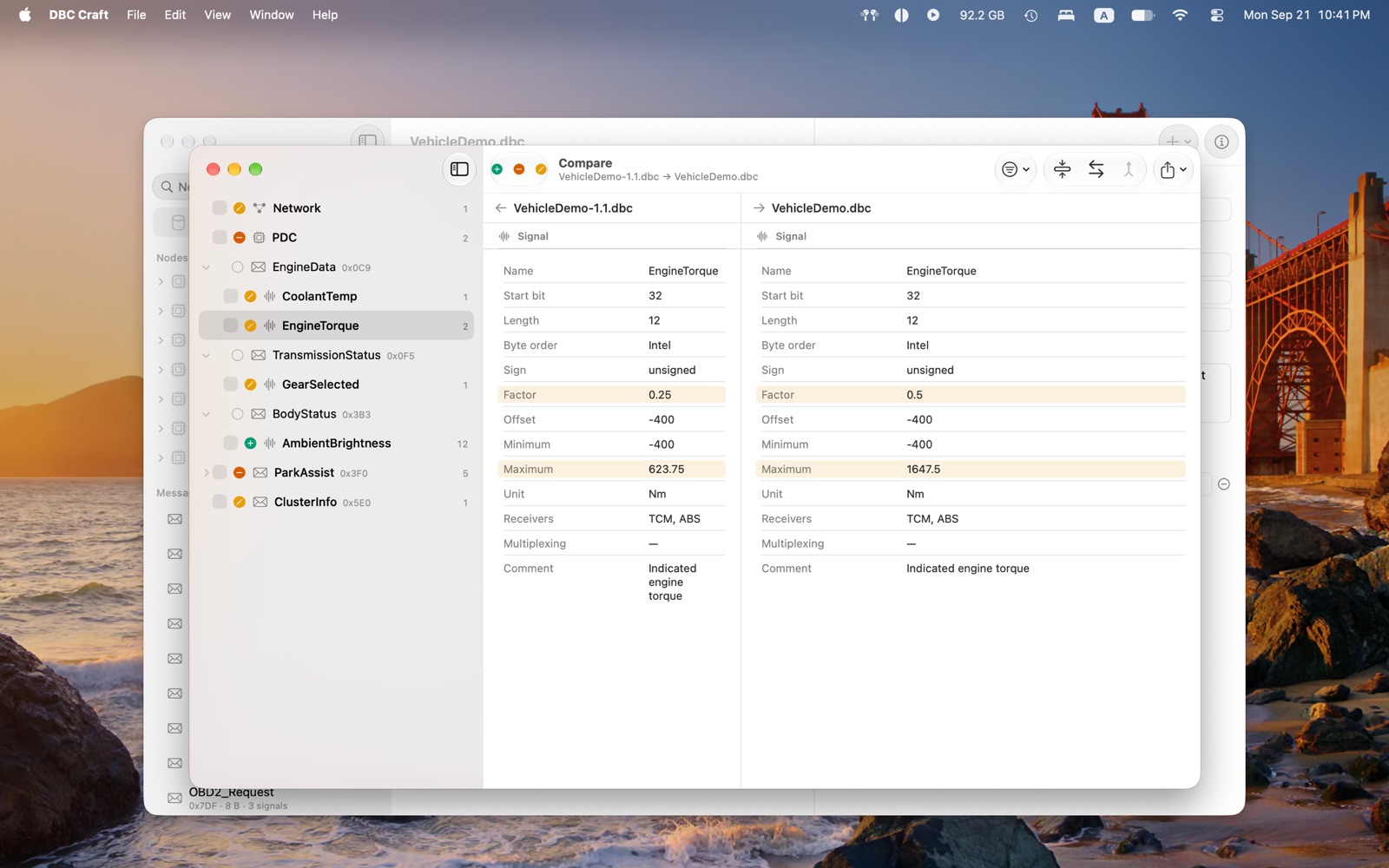 The compare window listing changed nodes, messages and signals between two versions of a database, with the selected signal's properties side by side